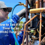 Mountain Peak Air technician works on HVAC unit
